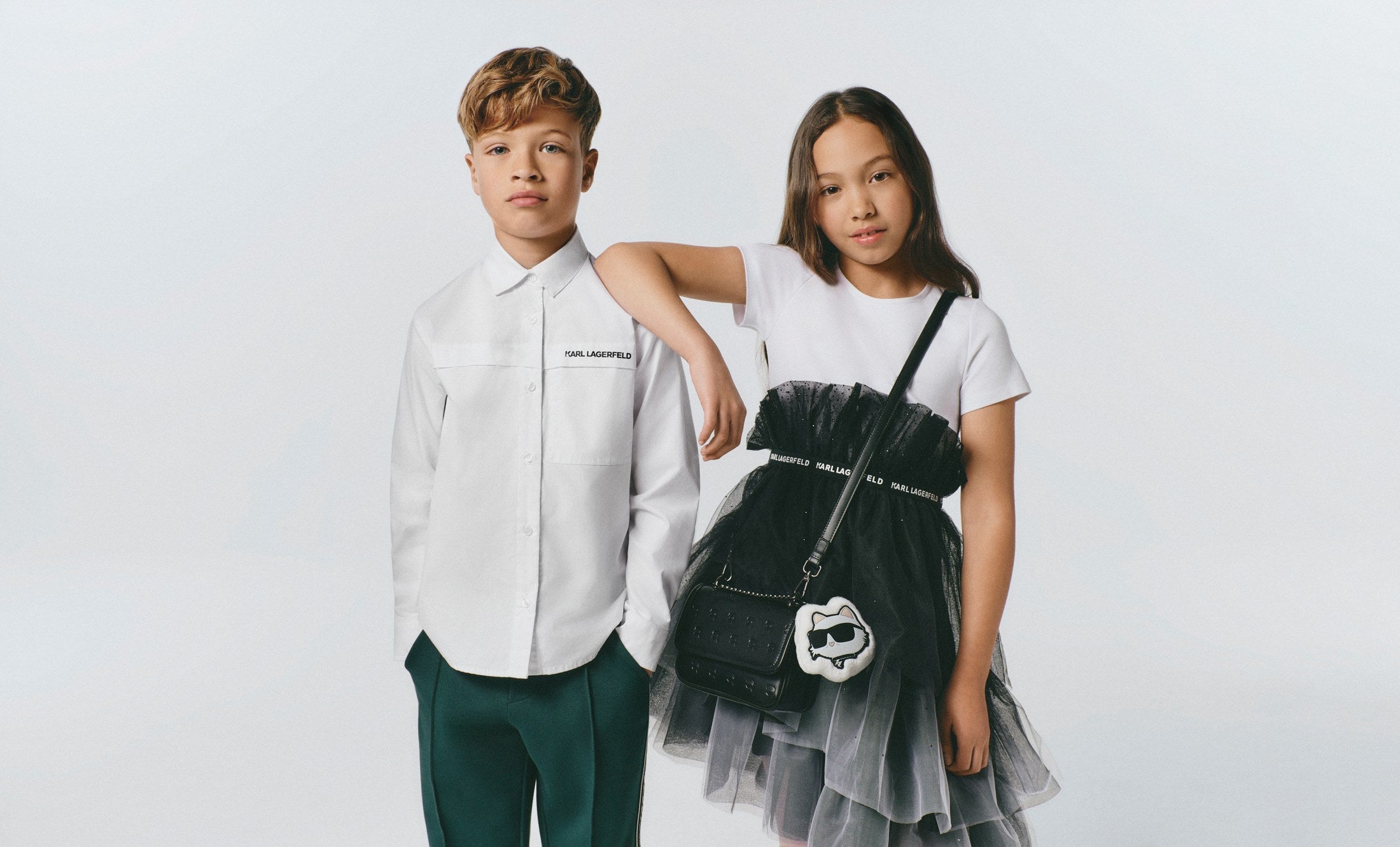 Twee kinderen in Karl Lagerfeld Kids winteroutfits — Karl Lagerfeld Kids winter 2026 bij Niñoz Almere
