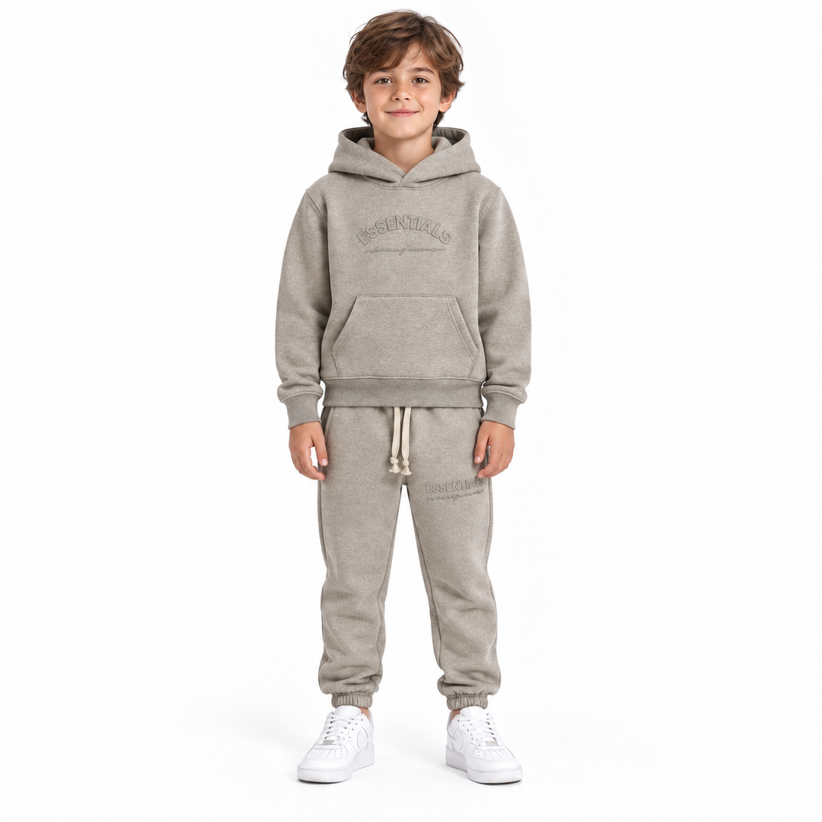 Essentials Cou7ure kids Curve Tracksuit donkerbeige gedragen in maat 8 jaar – designer kinderkleding | Niñoz Almere