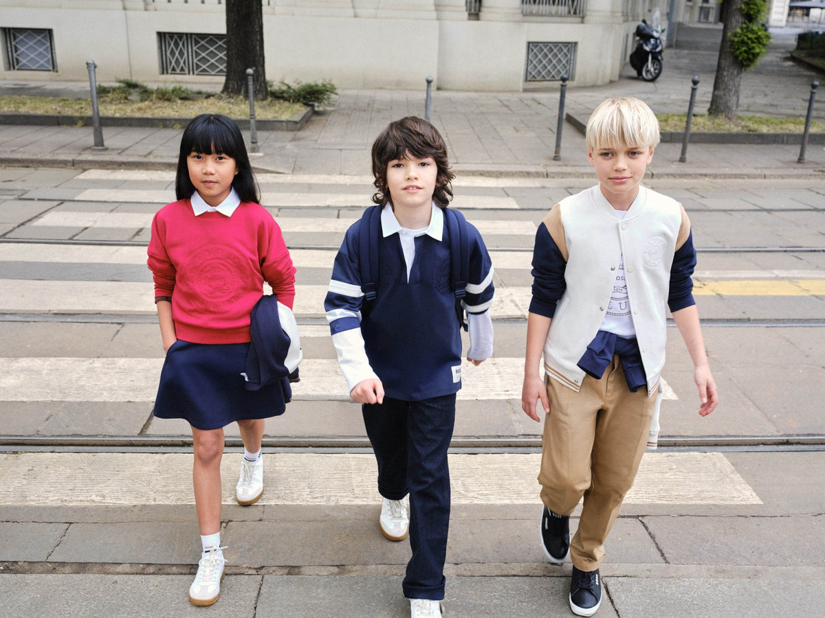 Groep kinderen in BOSS winteroutfits — kinderkleding 4-8 jaar bij Niñoz Almere