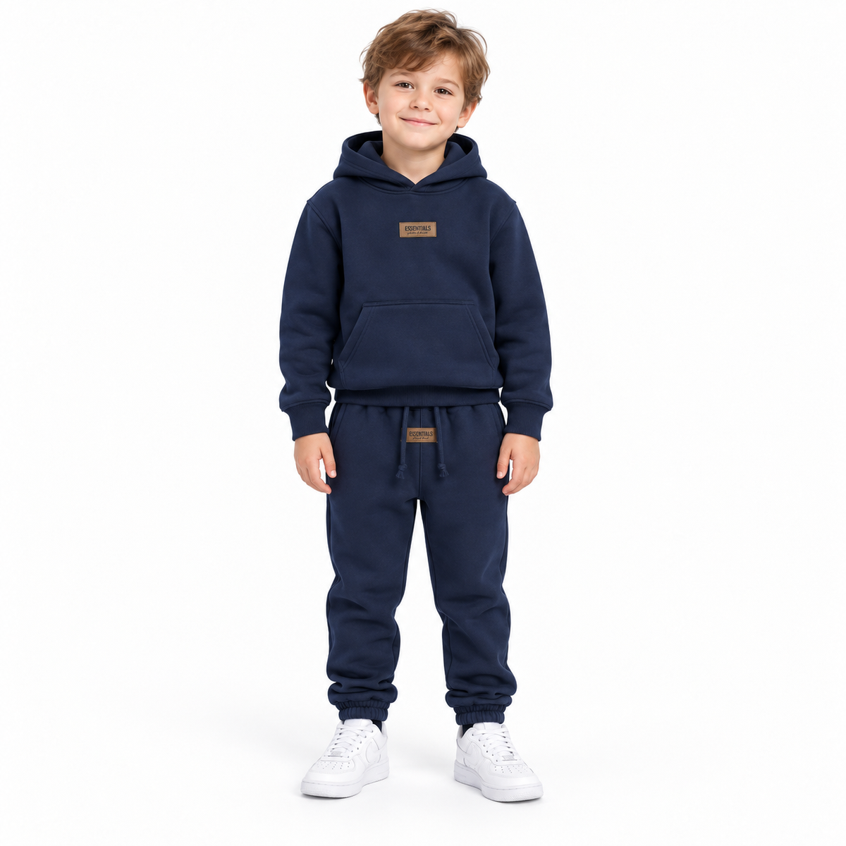 Essentials Cou7ure kids Rubber Tracksuit donkerblauw gedragen in maat 6 jaar – designer kinderkleding | Niñoz Almere